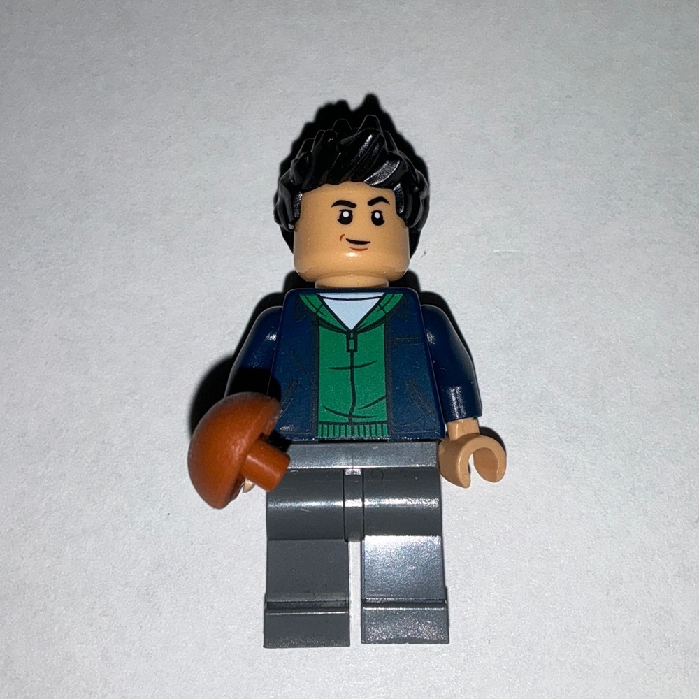 Kenji Kon - Dark Blue Jacket over Green Hoodie